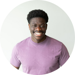 Kojo Otchere-Addo, Sr. Business Analyst Kojo Otchere-Addo, Sr. Business Analyst, smiling at BerkleyNet, a fast and easy workers compensation insurance provider.