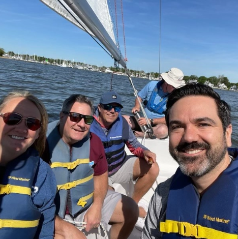 life at BNet image: team members on a boat ride